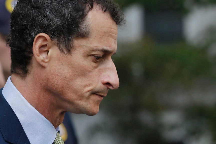 A closeup, headshot of Anthony Weiner looking down.