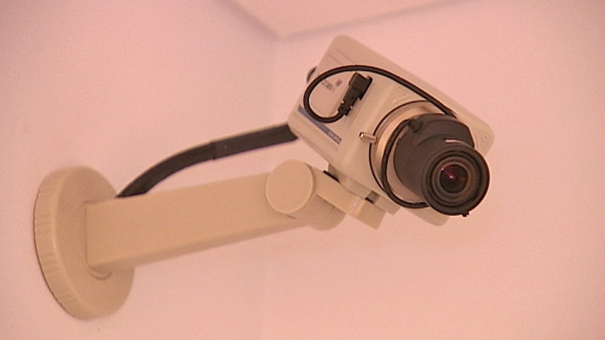 Video still: Security camera attached to the wall of Belconnen police station - Good generic CCTV