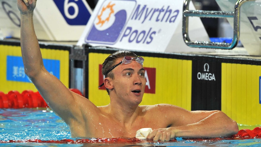 Aussie gold ... Robert Hurley claims gold in the men's 50m backstroke.