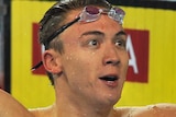 Aussie gold ... Robert Hurley claims gold in the men's 50m backstroke.