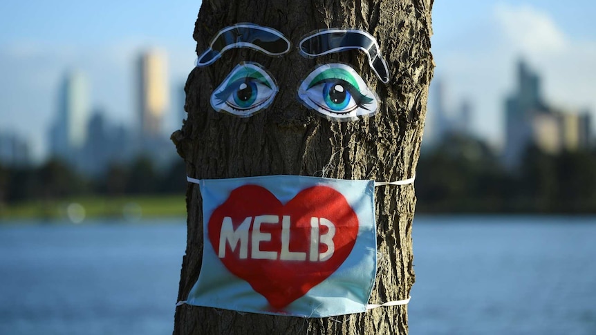 Artwork showing a tree with a mask on