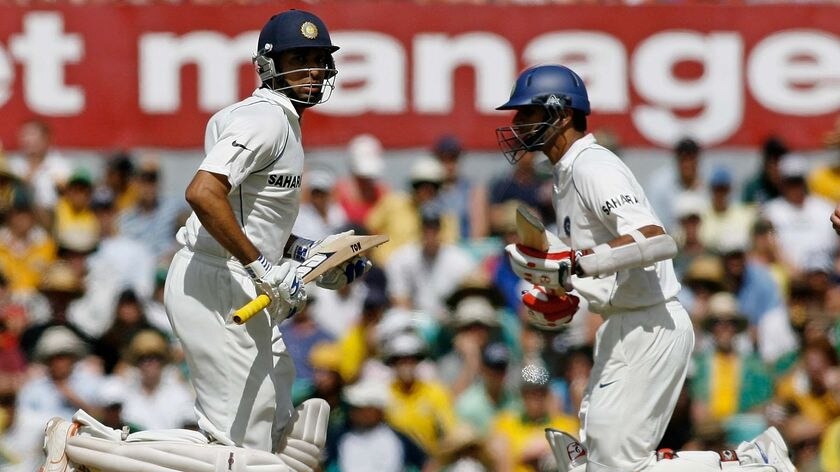 Vital partnership ... VVS Laxman (l) and Rahul Dravid run between the wickets