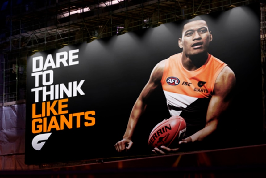 A picture of a poster with Israel Folau handballing and 'Dare to think like Giants' written next to it