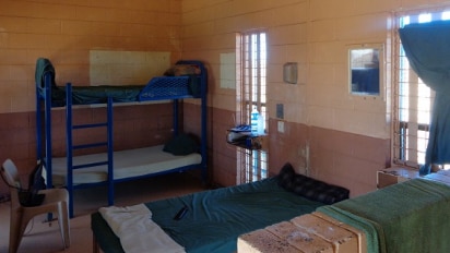 Interior of a cell in Roebourne Regional prison showing several beds.
