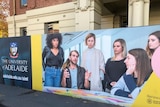 An ad showing a young man surrounded by young women.