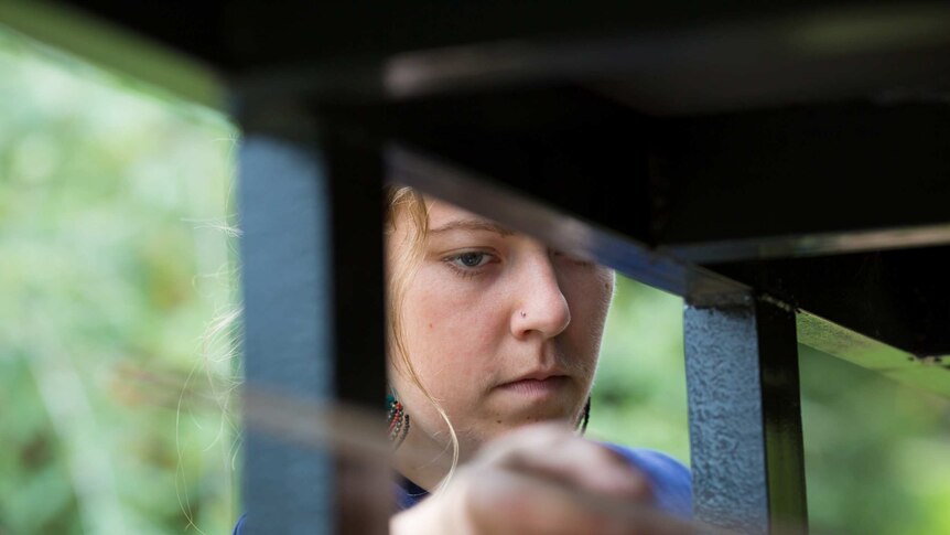 Sarah Smethurst works on her tiny house.