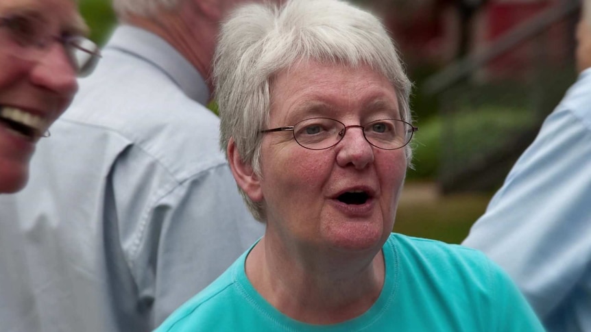 Pauline Wilson wears a green top.