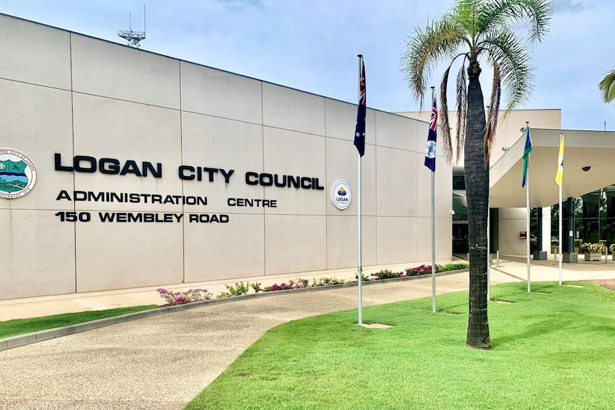 A building with sign "Logan City Council Administration Centre 150 Wembley Road" written on it