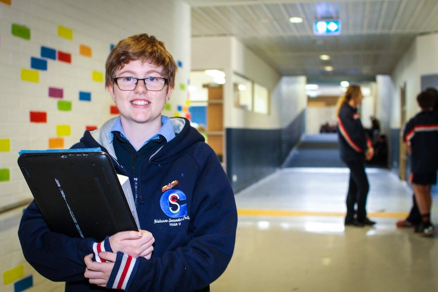 Kieran Atkins in corridor of Gisborne Secondary College