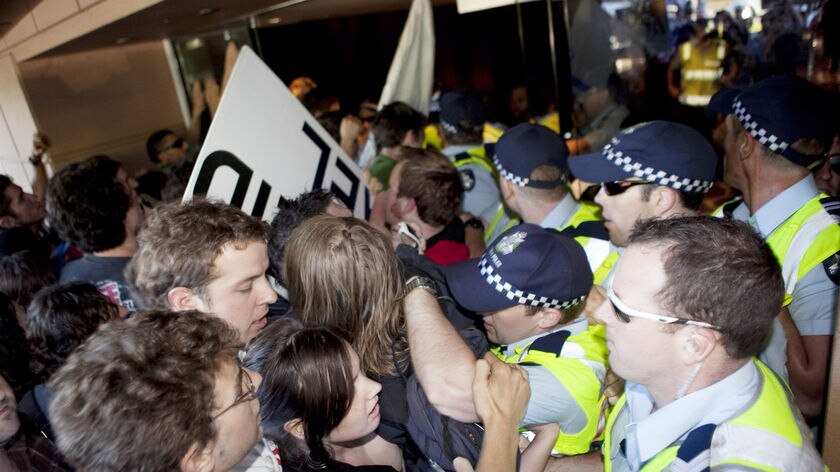 Protesters attempt to break into a dinner for the Australia Israel Leadership Forum