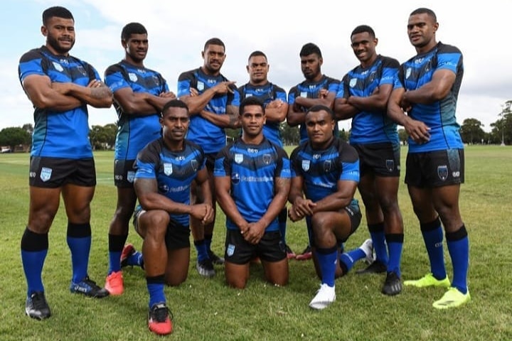 Ten Kaiviti Silktails players pose for a photo at training ahead of their Ron Massey Cup debut in Sydney in 2021.
