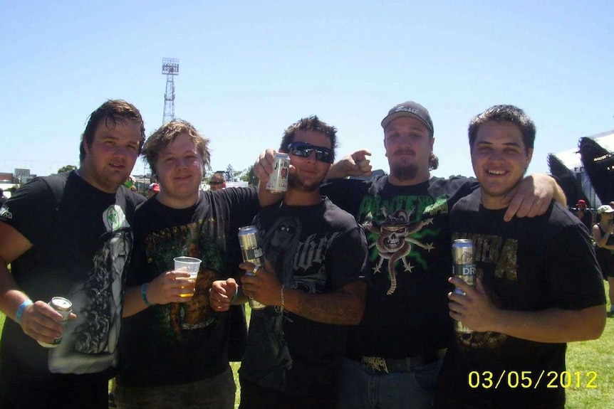 Jake Howe and some mates pose for a picture at Soundwave music festival, just days before the accident