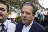 British art tycoon Charles Saatchi arrives to give evidence at Isleworth Crown Court in west London.