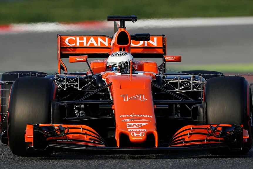 Fernando Alonso drives during preseason testing
