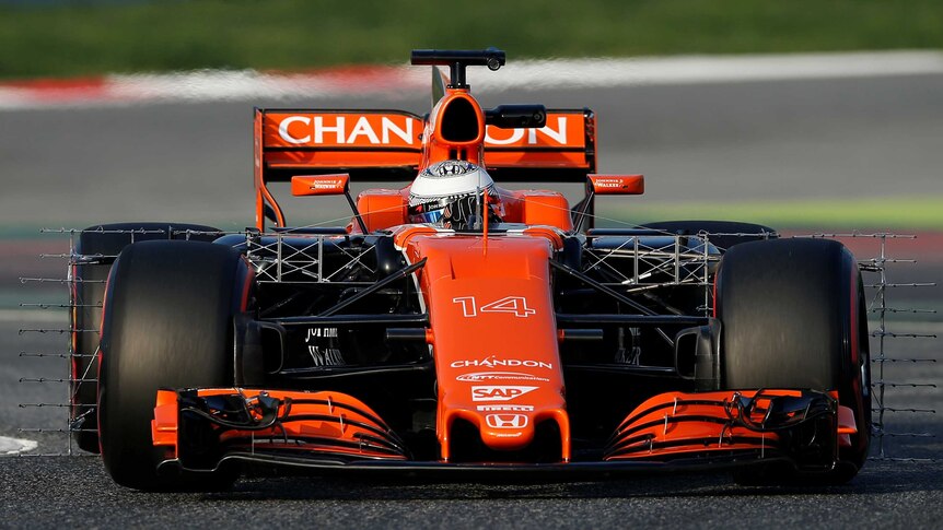 Fernando Alonso drives during preseason testing