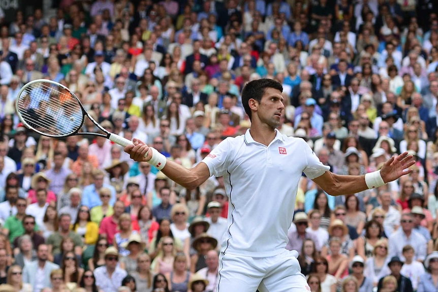 Novak Djokovic lines up a forehand in the Wimbledon final