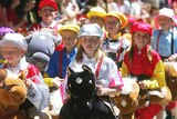 Diva fever: Children have paraded alongside the connections of the Melbourne Cup favourites.