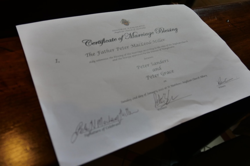A certificate of marriage blessing, signed by Father Peter 