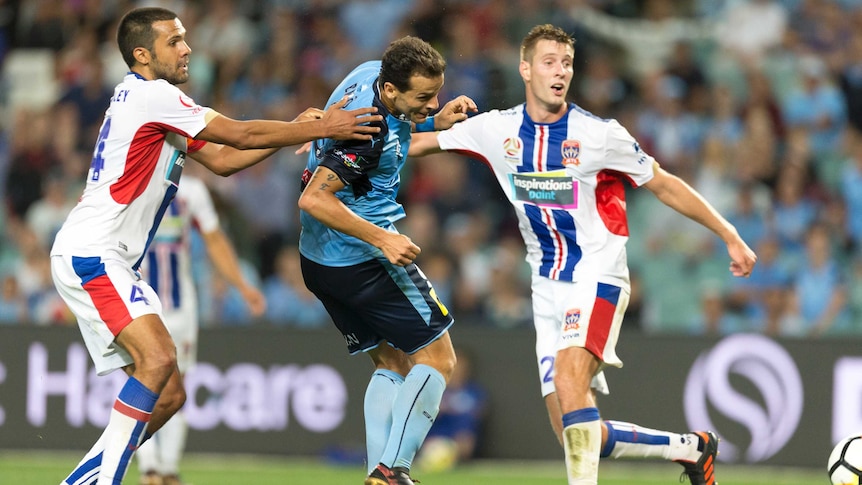 Bobo of Sydney FC scores the equaliser against Newcastle Jet at the Sydney Football Stadium.