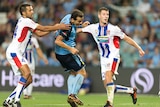 Bobo of Sydney FC scores the equaliser against Newcastle Jet at the Sydney Football Stadium.