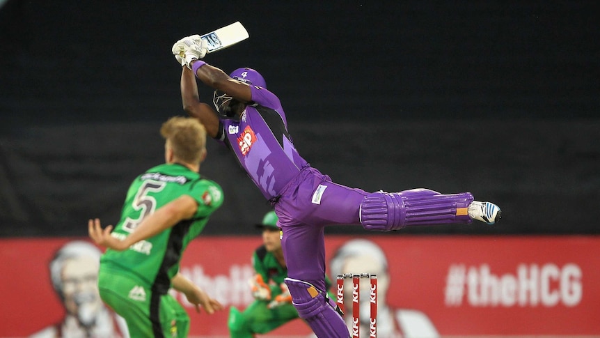 Hobart Hurricanes' Darren Sammy swings at the Melbourne Stars bowling in the Big Bash at the MCG.