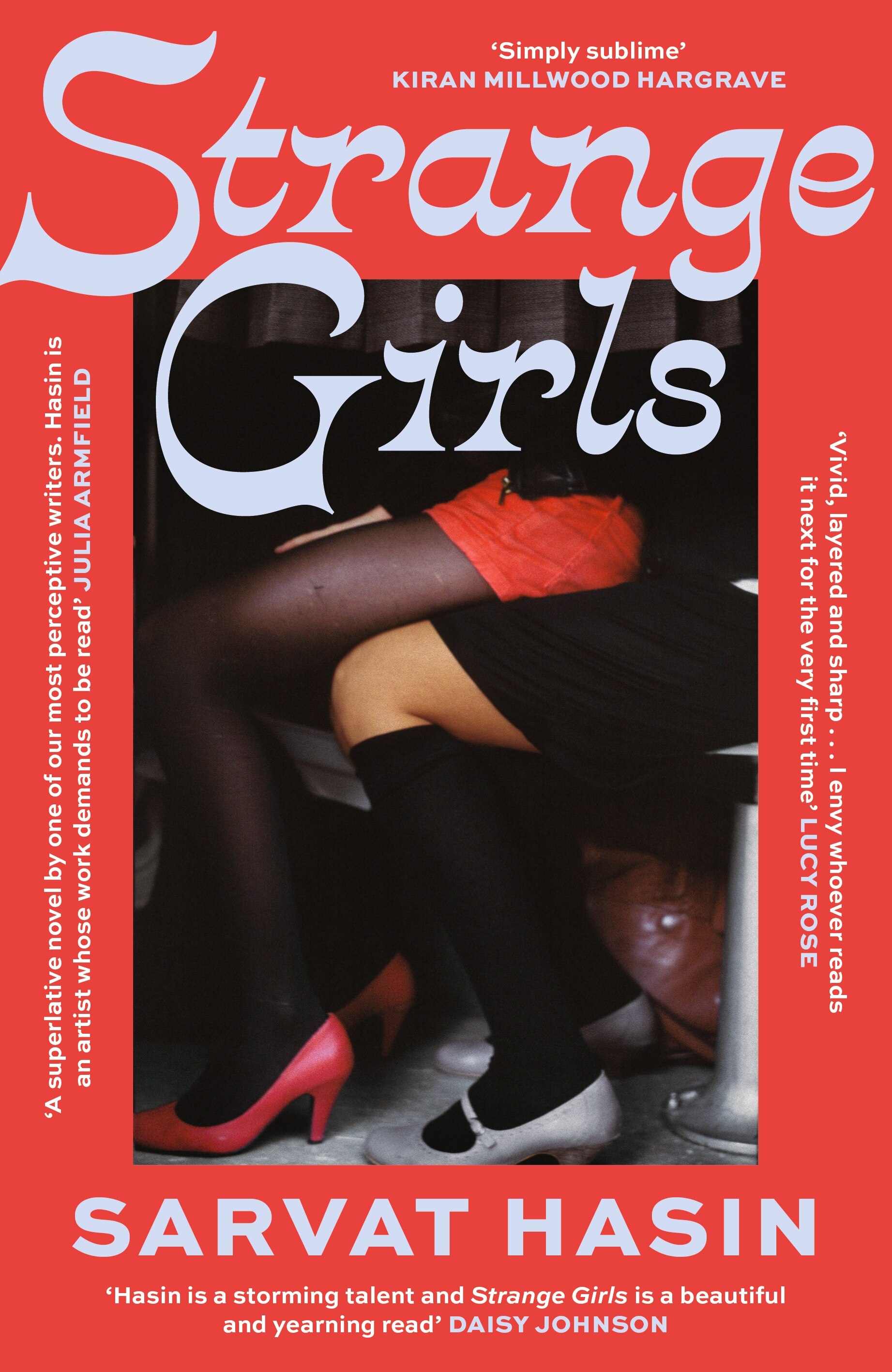 Cover of Strange Girls by Sarvat Hasin; a photo of two sets of legs in stockings and high heels, one person sitting on another.