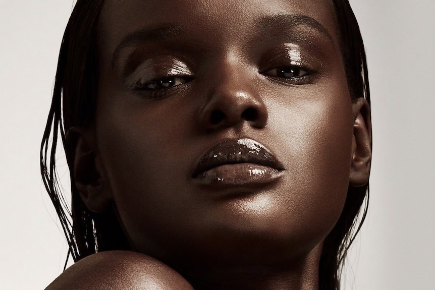 Model Duckie Thot in Fenty campaign, a cosmetics brand made by and for women of colour to match their skin tones.