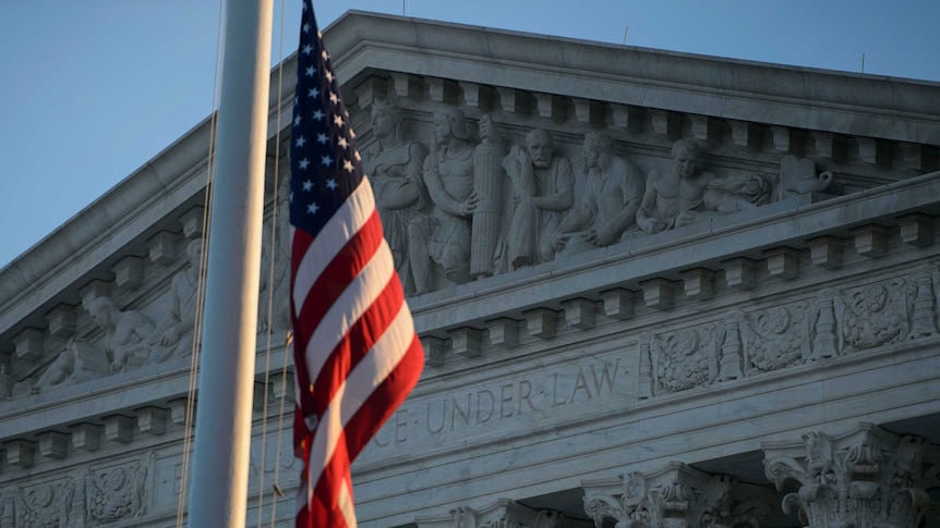 US Supreme Court with American flag