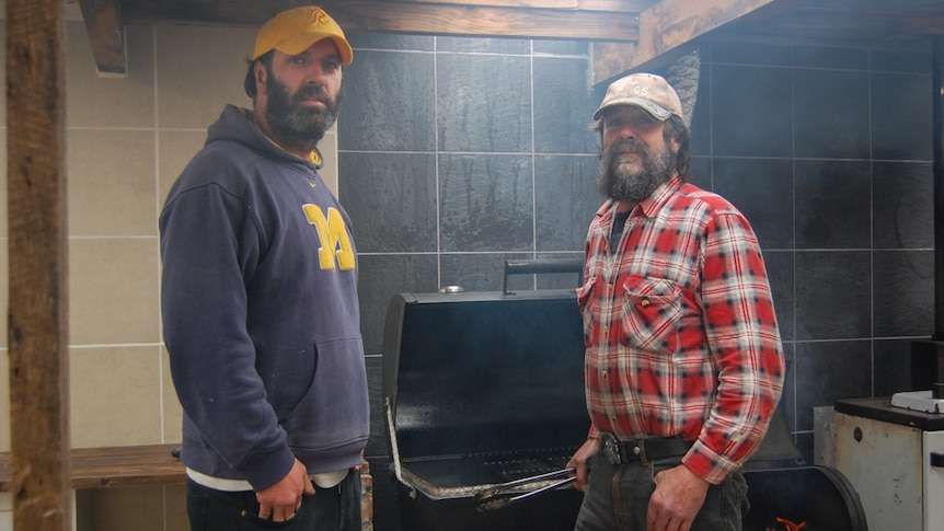 Rohan Peterson (left) and Jethro Nykiel (right) form one half of the Ro 'n' Slow BBQ Team to represent Tasmania in barbecuing.