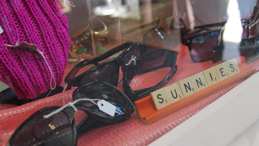 A pair of second-hand sunglasses for sale at a Tweed Heads op shop