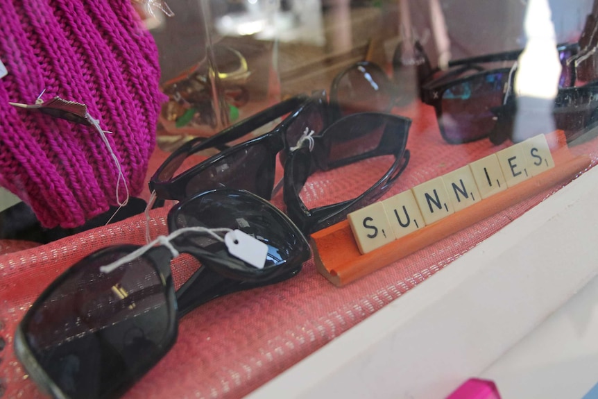 A pair of second-hand sunglasses for sale at a Tweed Heads op shop