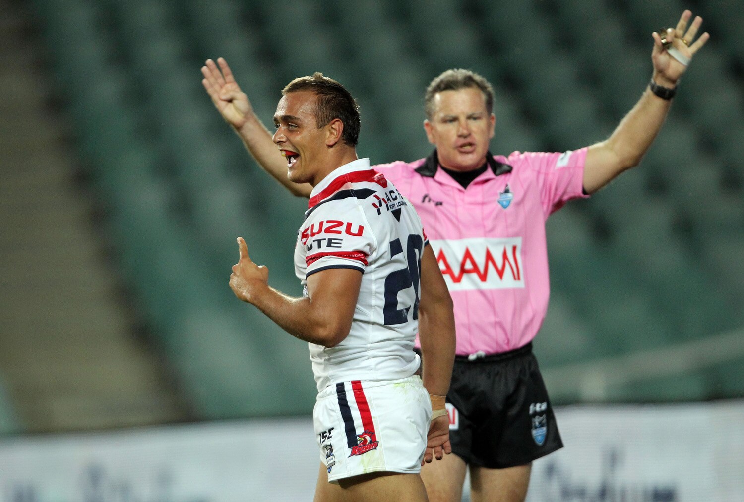 Roosters grant Perrett release to Dogs - ABC News