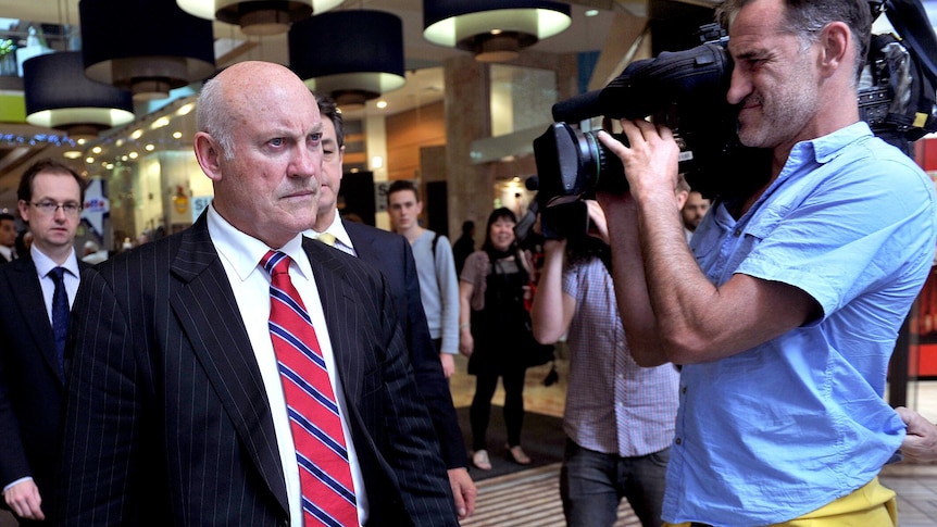 Ian Macdonald leaves the ICAC in Sydney during a break.