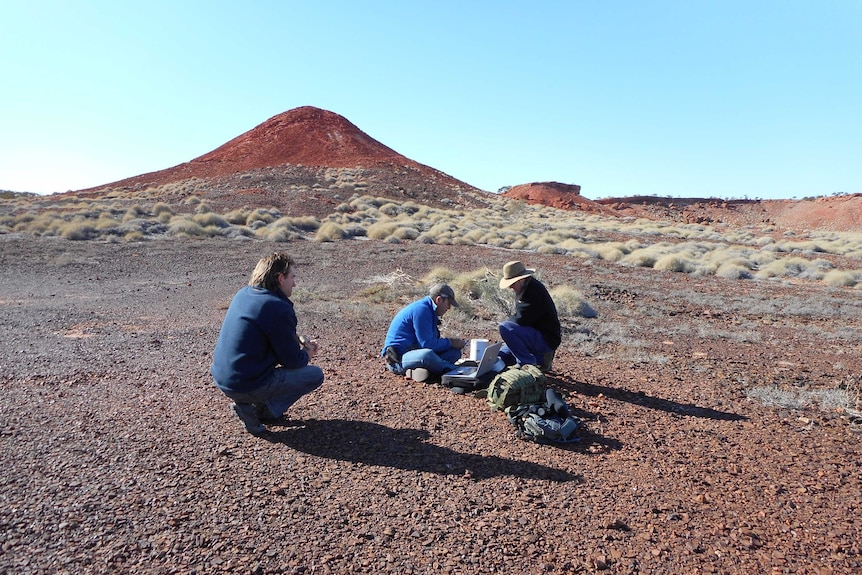 Dr Jim Radford, Steve Murphy and Rachel Barr doing research on the night parrot on a south-west Queensland property.