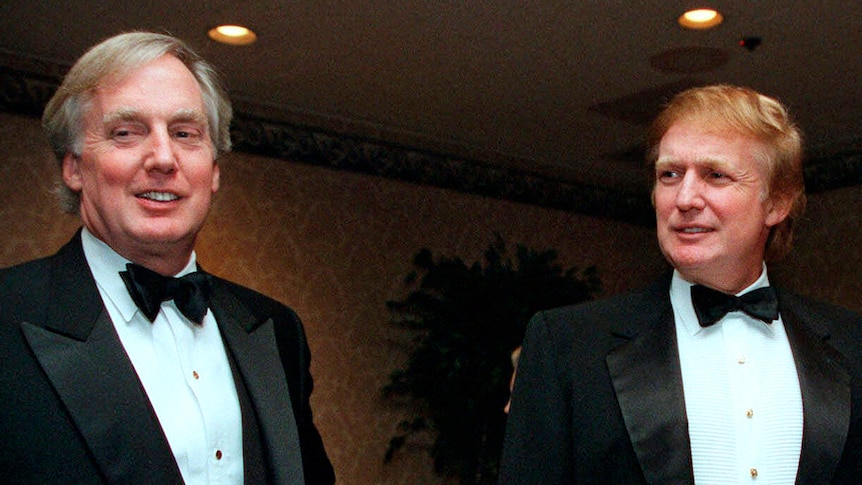 Robert Trump, left, joins Donald Trump at an event in New York in 1999.