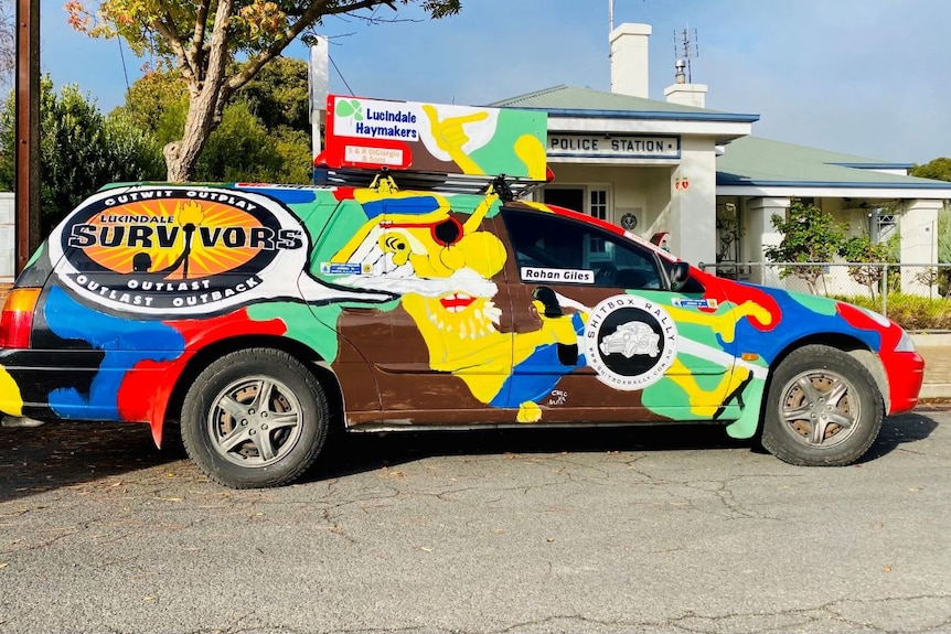 A brightly coloured Ford wagon that is set to be used in the Shitbox Rally.