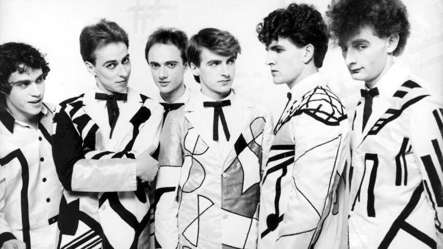 A black and white photo of Split Enz