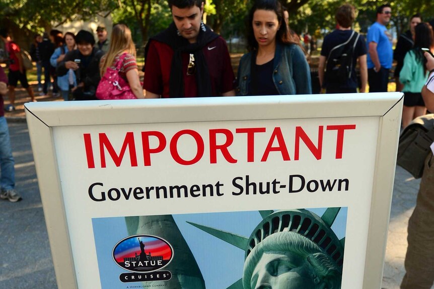 Sign states that the Statue of Liberty is closed due to a US government shutdown.