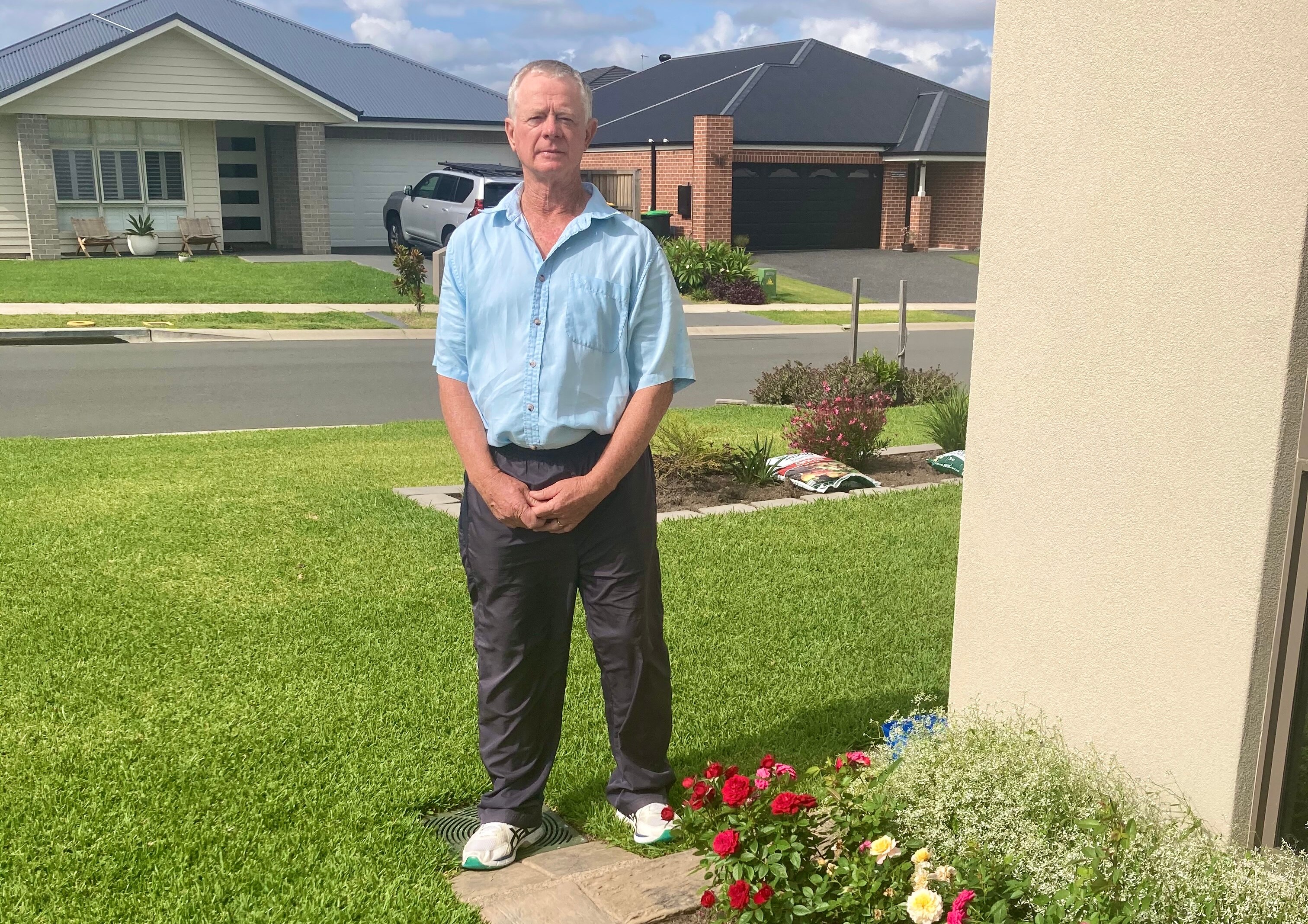 A man standing on a lawn