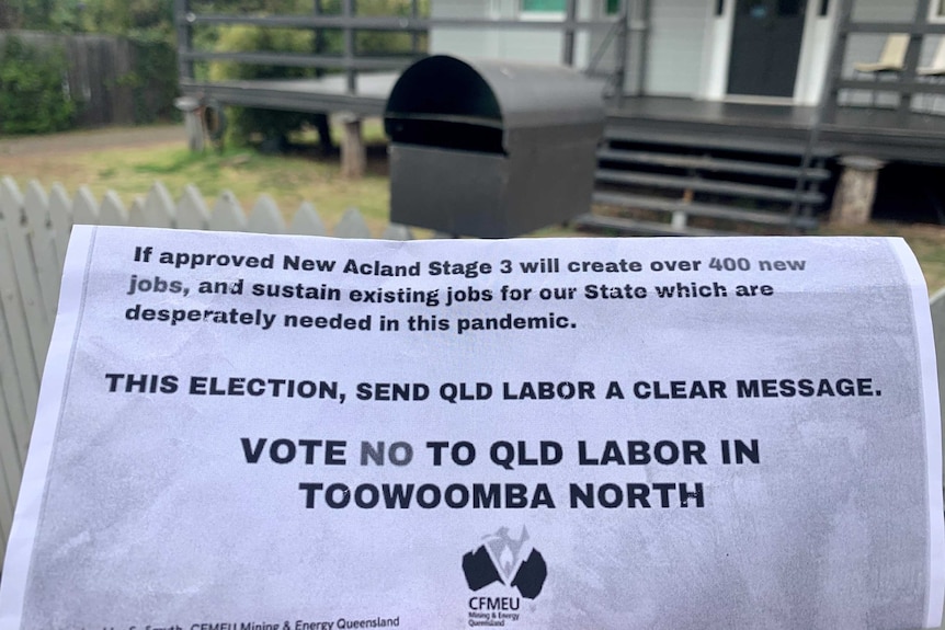 A flyer encouraging people to 'vote no' to QLD labor in a letter box.
