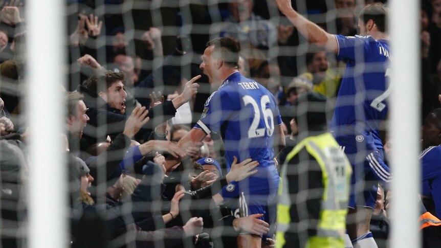 Chelsea defender John Terry (C) celebrates his late equaliser against Leicester at Stamford Bridge.