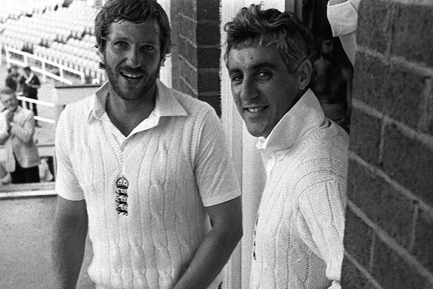 Two English male cricketers smile on a balcony at Headingley in 1981.