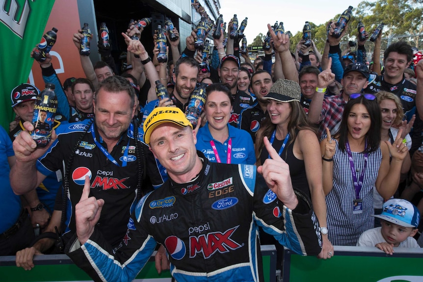 Mark Winterbottom celebrates his V8 Supercars title