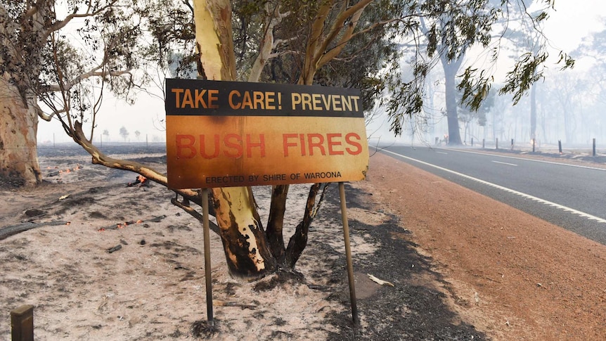 A fire-blackened sign in Waroona shire