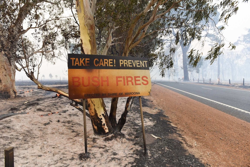 A fire-blackened sign in Waroona shire