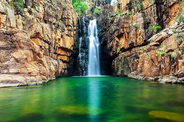 A waterfall falls into the Southern Rockhole at Nitmiluk National Park in the Northern Territory.