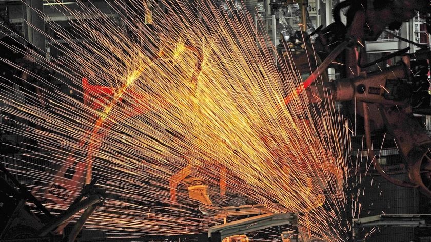 Sparks fly on a factory floor