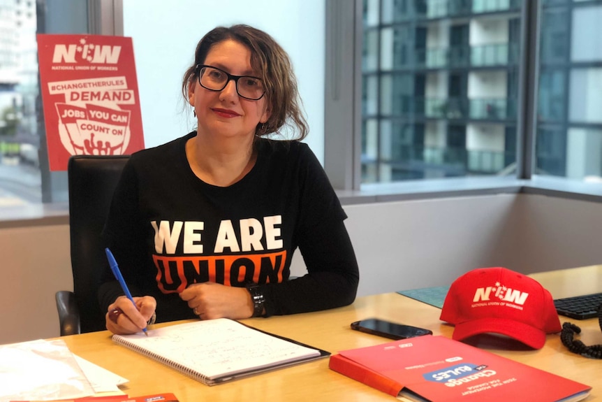 Caterina Cinanni, National Union of Workers National President, sitting at her desk.