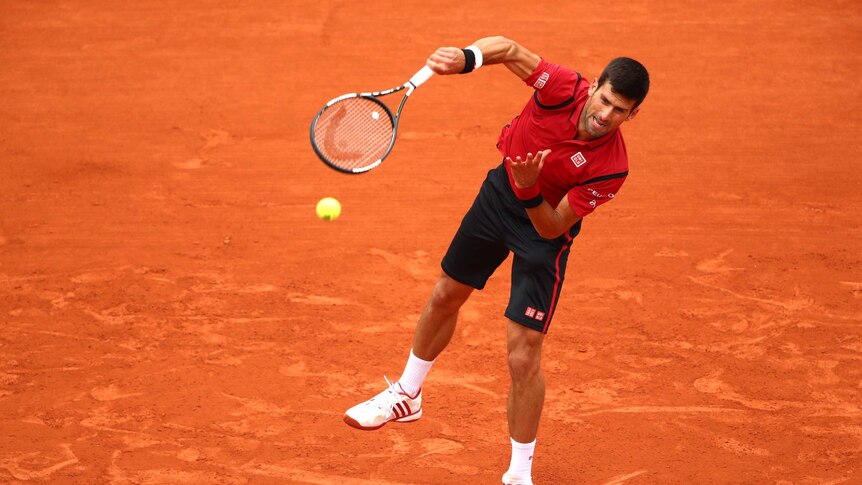Serbia's Novak Djokovic serves against Taiwan's Lu Yen-Hsun at the French Open.
