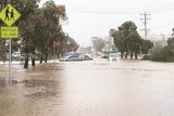 Cars parked in floodwater in downtown Broken Hill.